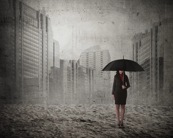 Asian business woman holding umbrella — Stock Photo, Image