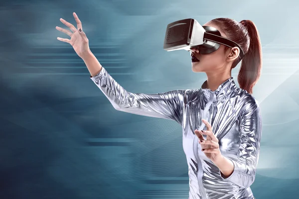 Woman in latex costume and VR headset — Stock Photo, Image