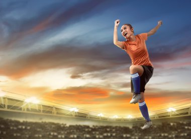 Mutlu kadın futbol oyuncusu