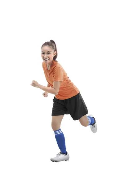 Jogadora de futebol feminino correndo — Fotografia de Stock