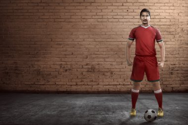 Asya Futbol oyuncu ayakta 