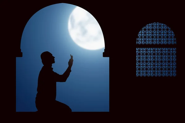 Man praying with mosque background — Stock Photo, Image