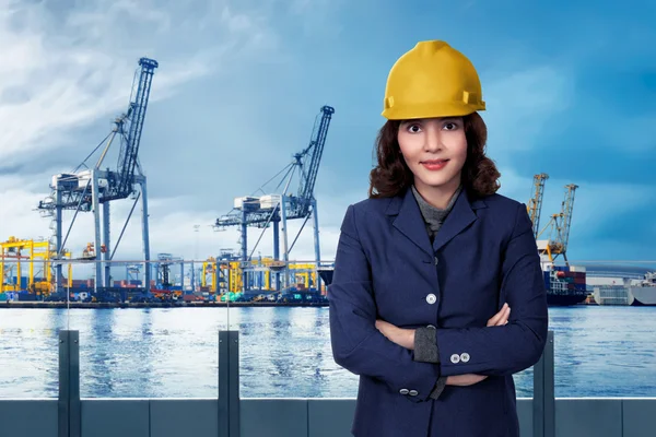 Business woman with a suit and a yellow helmet — Stock Photo, Image