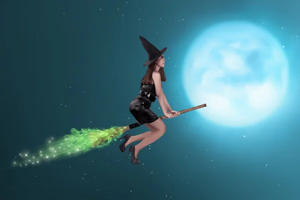 Witch woman flying in the sky — Stock Photo, Image