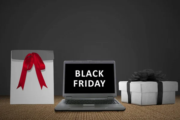 White Paper Bag Red Ribbon Laptop Gift Box Black Friday — Stock Photo, Image
