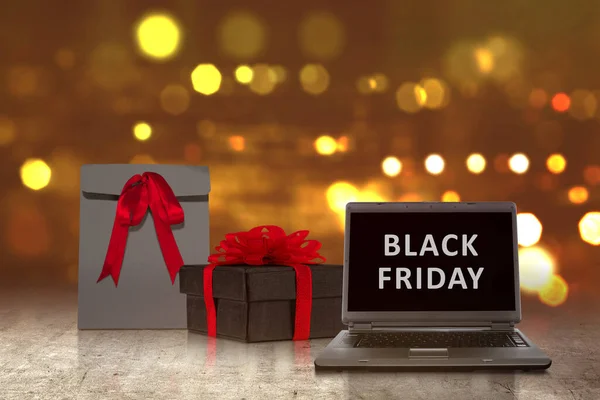 Black Paper Bag Red Ribbon Laptop Gift Box Black Friday — Stock Photo, Image