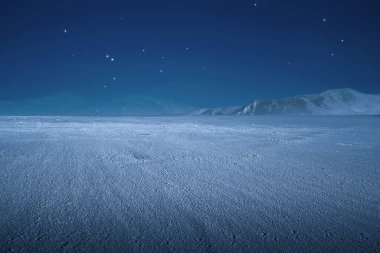 Kışın kar yağışı ve mavi bir arka plan.