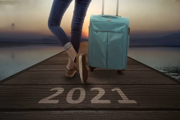 2021 Wooden Pier Traveler Woman Suitcase Happy New Year 2021 — Stock Photo, Image