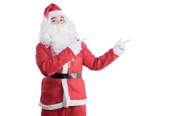 Asiatischer Mann Weihnachtsmannkostüm Zeigt Etwas Vereinzeltes Über Weißem Hintergrund Platz — Stockfoto