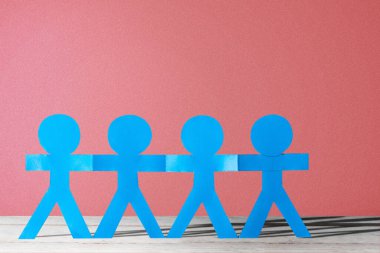 Mavi insanlar, renkli bir geçmişle el ele tutuşuyorlar. Dünya Nüfus Günü kavramı