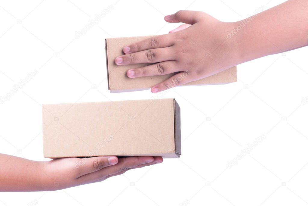 Human hand holding cardboard box isolated over white background