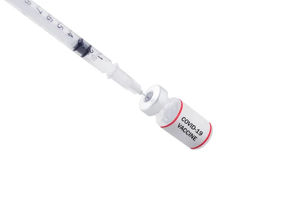 白の背景に隔離されたシリンジとCovid 19ワクチン — ストック写真