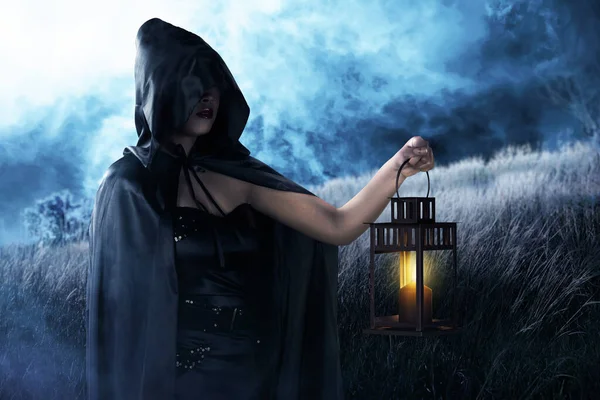 Asian Witch Woman Black Cloak Holding Lantern Standing Field — Stock Photo, Image
