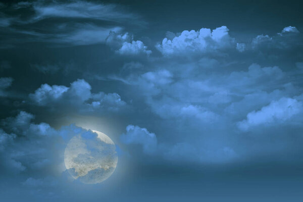 Full moon with dark cloudscapes on the night. Halloween concept