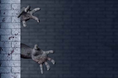 Terk edilmiş bir binada, duvarın arkasında yaralı ve kanlı bir zombi eli var.