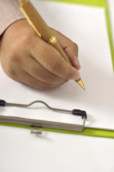 Man Writing On Blank Paper On Clipboard — Stock Photo, Image