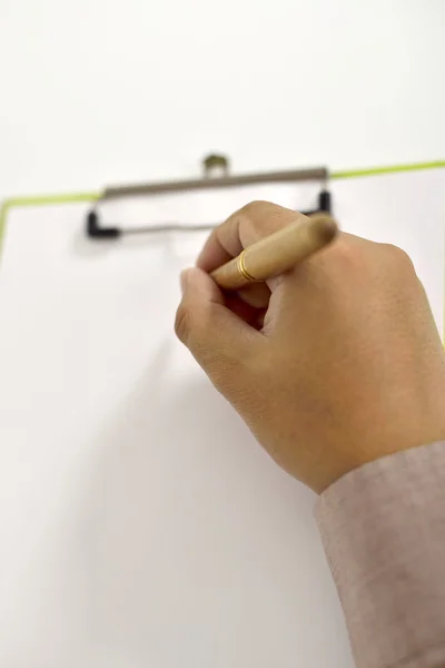 Man Writing On Blank Paper On Clipboard — Stock Photo, Image