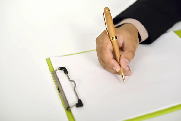 Business Man Writing On Clipboard — Stock Photo, Image