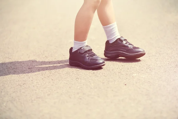 Kid wearing shoes — Stock Photo, Image