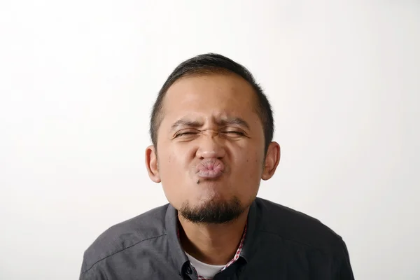 Rolig asiatisk kille att göra ansikten — Stockfoto