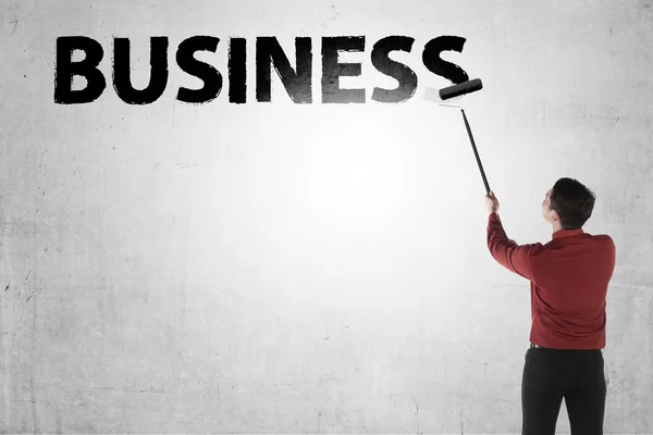 Business man paint business word — Stock Photo, Image