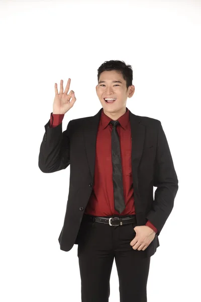 Asian business man give hand gesture OK — Stock Photo, Image