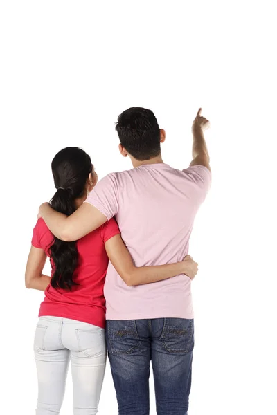 Young asian couple pointing something — Stock Photo, Image