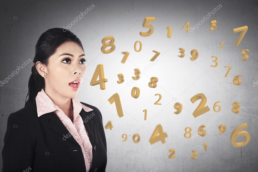 Business woman speaking about number