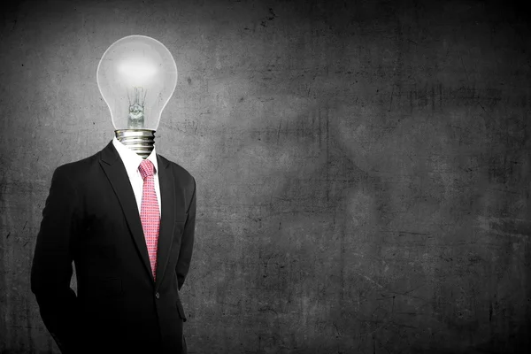 Uomo d'affari con testa di lampada — Foto Stock