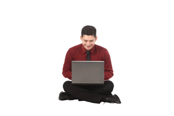 Asian business man working on a laptop — Stock Photo, Image