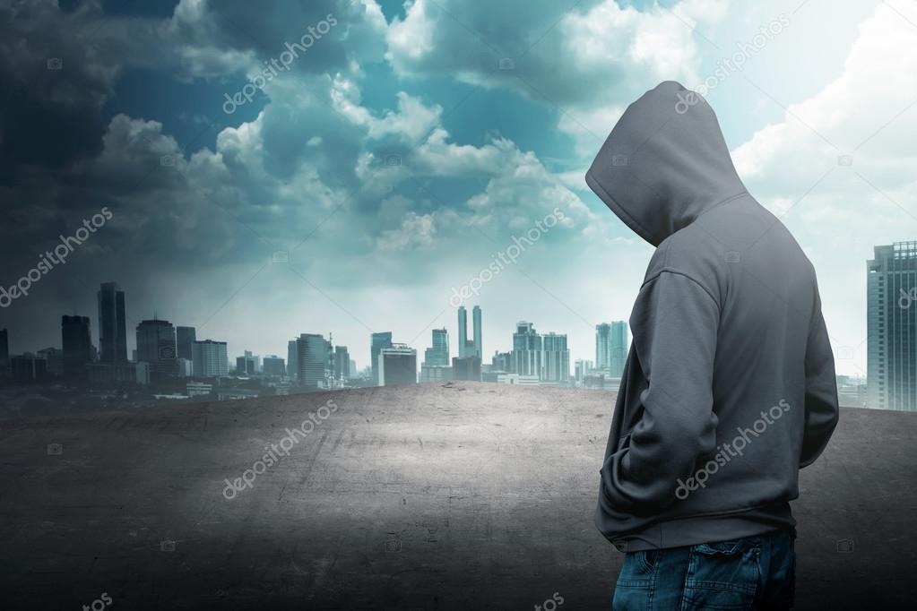 Faceless Man In Hood On The Rooftop Stock Photo Image By C Leolintang 79833436