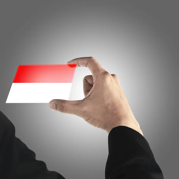 Mann im Besitz einer indonesischen Karte — Stockfoto