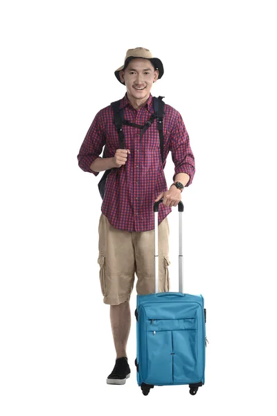 Jovem turista do sexo masculino levar mala — Fotografia de Stock