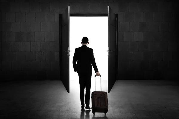 Business man standing toward door — Stock Photo, Image