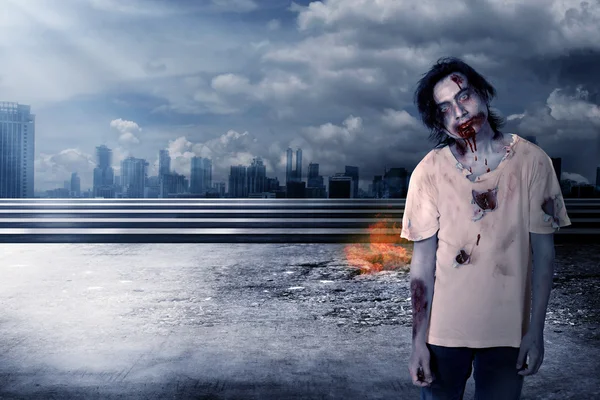 Creepy male zombie in the city — Stock Photo, Image