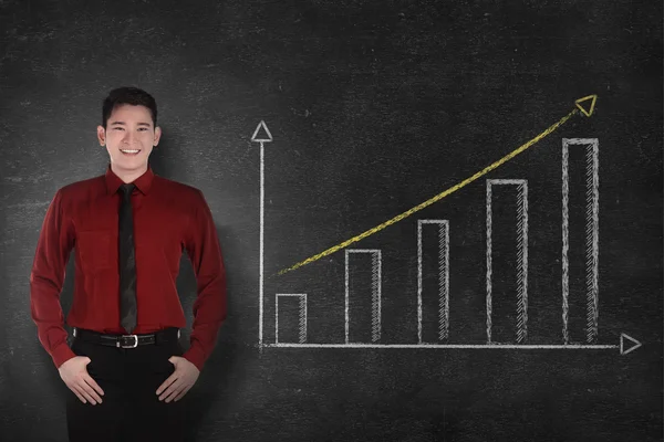 Business man smile with chalk board graph — Stock Photo, Image