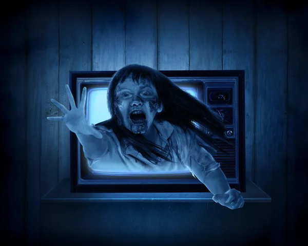 Scary ghost out from old television — Stock Photo, Image