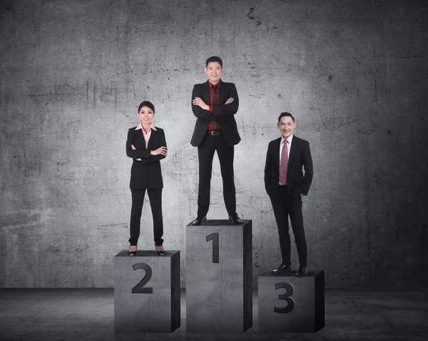 Business person standing on the podium — Stock Photo, Image