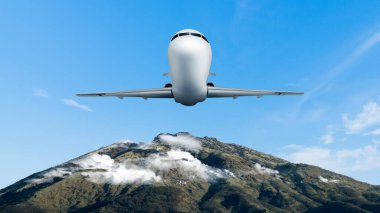 Dağ zirvesinin üstünde arka planda bulutlarla uçan uçaklar. Uçak konseptiyle seyahat