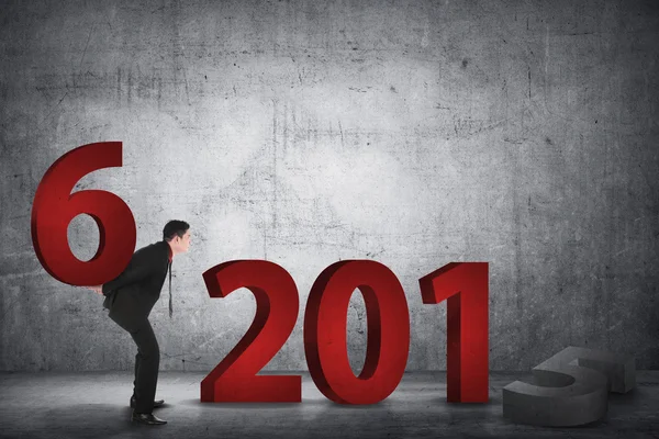 Pessoa de negócios mudando número de 2015 com 2016 — Fotografia de Stock