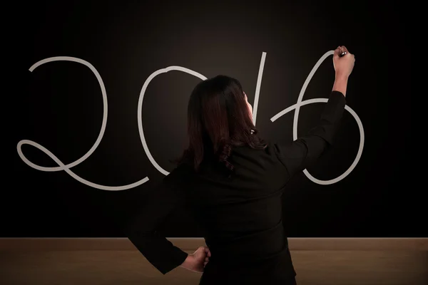 女商人写上黑板 2016年号 — 图库照片