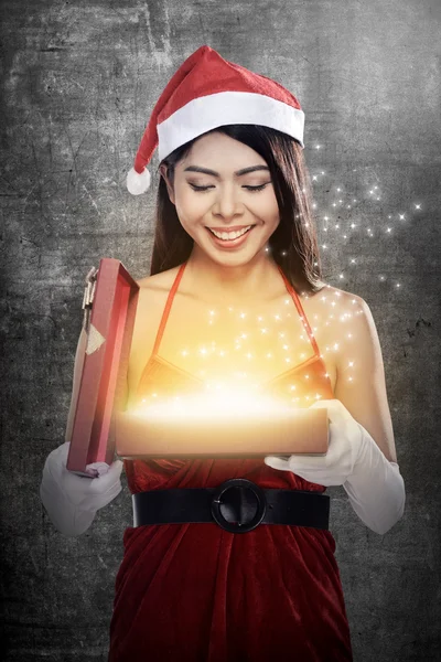 Santa Woman Opening Gift Box — Stock Photo, Image