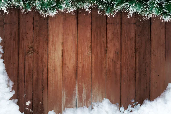 Sneeuw en houten plank — Stockfoto