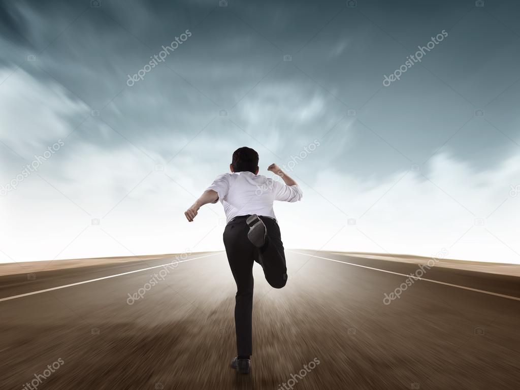 businessman running on the road
