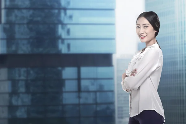 Businesswoman smiling over office — Stock Photo, Image