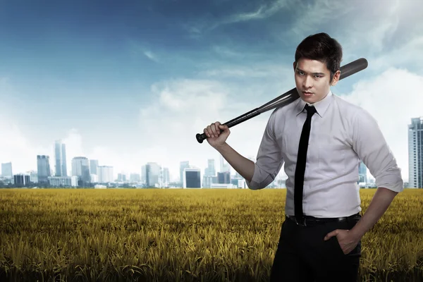 Man holding baseball bat — Stock Photo, Image