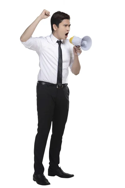 Hombre de negocios gritando en megáfono — Foto de Stock