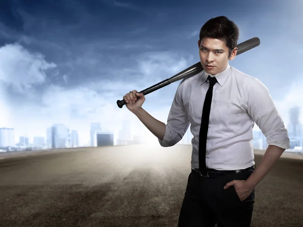 Man holding baseball bat — Stock Photo, Image