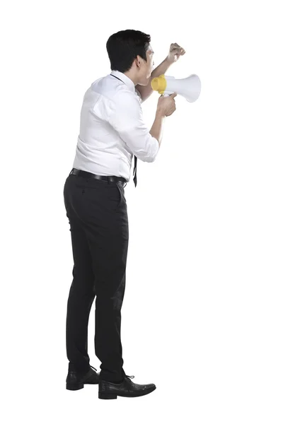 Asiatico uomo d'affari gridare su megafono — Foto Stock