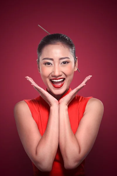 Chinese happy woman in cheongsam dress — Stock Photo, Image